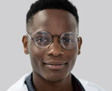 Close up of a confident male dental assistant