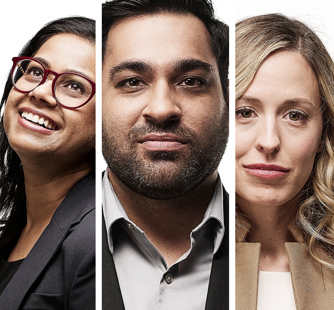 Three confident dental professionals, two female one male