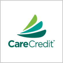 three swishes of various shades of green on top of the word care credit